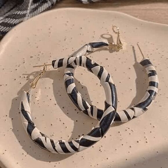 2/$21 Ladies Zebra Hoop Earrings - Picture 1 of 4